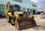 New Holland B100B с объемом ковша погрузчика/отвал 1,2 метра куб.
