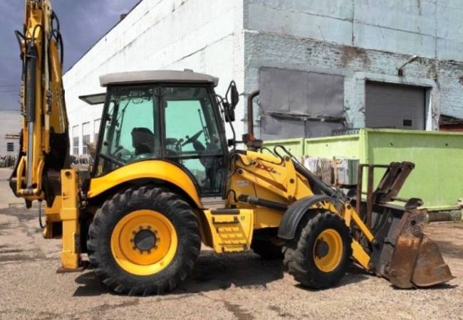 Экскаватор-погрузчик New Holland B100B